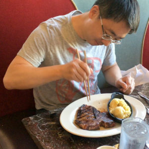 Chopsticks Marcosticks - eating a steak with chopsticks