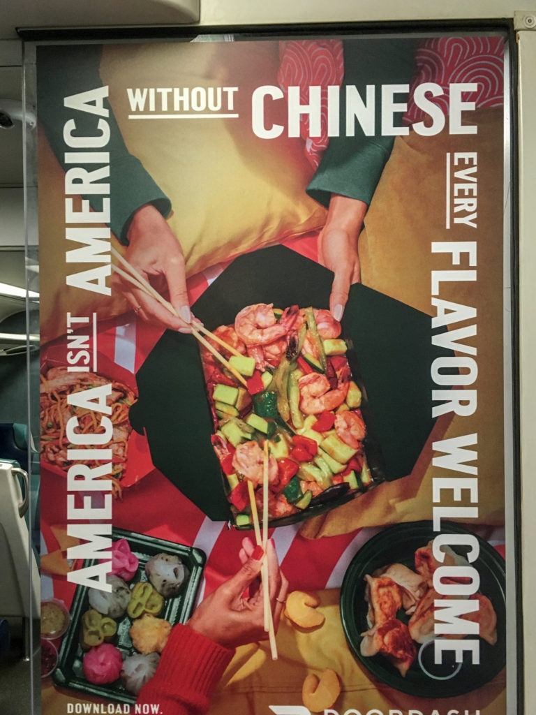 Marcosticks - Finger Pistol Grip - Advertisement Poster on LIRR - IMG_8280-chopsticks