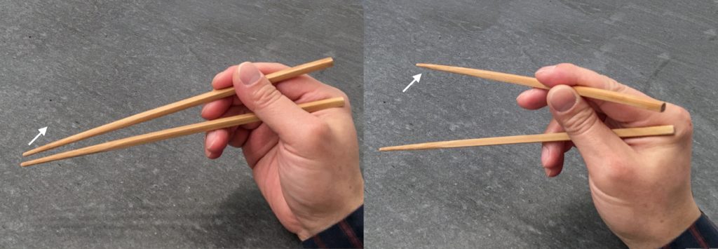 Standard Grip with Sideway Swing held aft-chopsticks, seen from the side