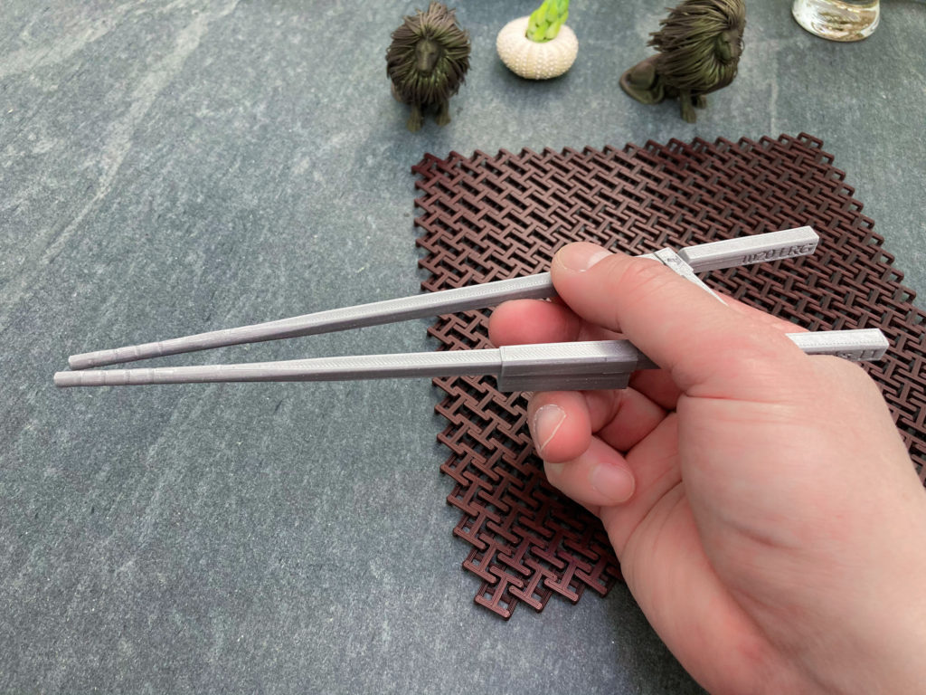 3D-printed M20 large training chopsticks with M22 ring finger helper enabling bent thumb - closed posture