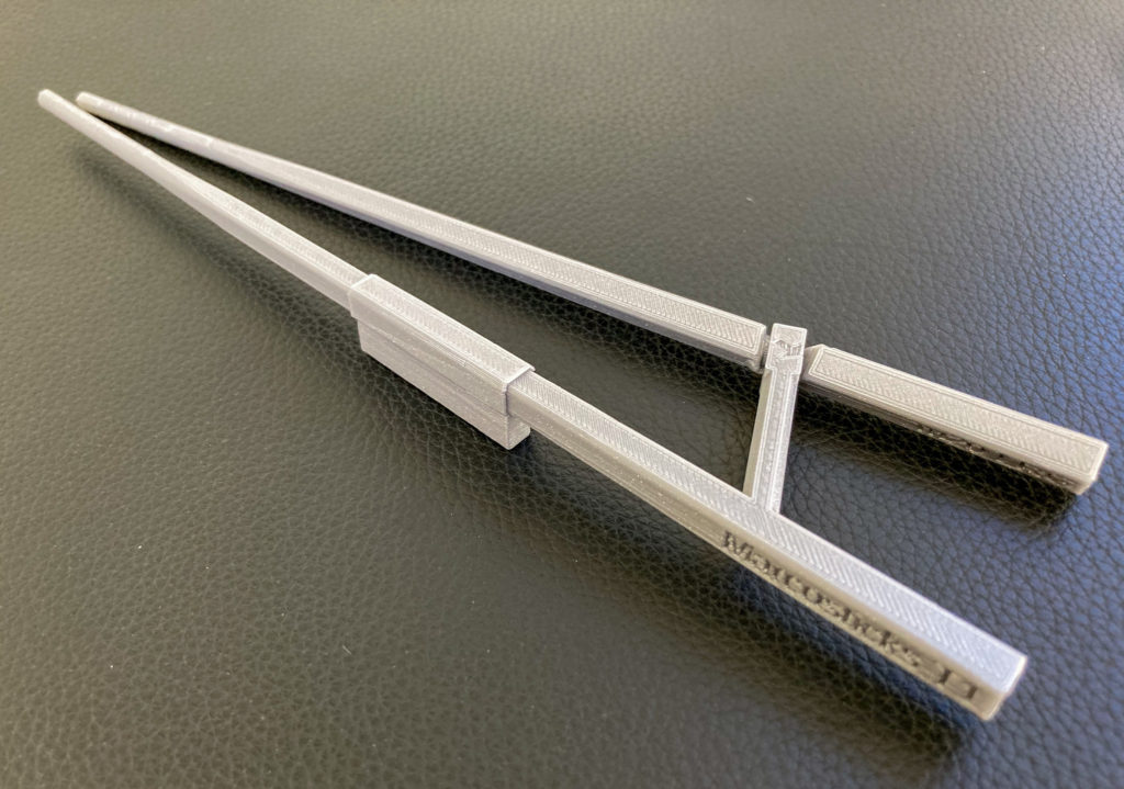 3D-printed M20 large training chopsticks with M22 ring finger helper enabling bent thumb