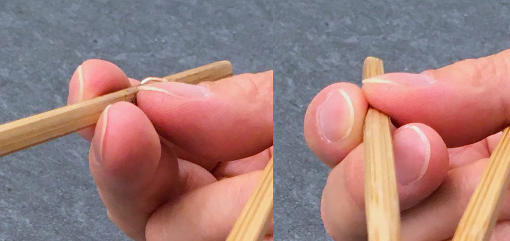 Flattened thumb pose for Standard Grip, seen from the front to illustrate rolling of top stick from closed to open posture, as planetary gears - close-up - reordered