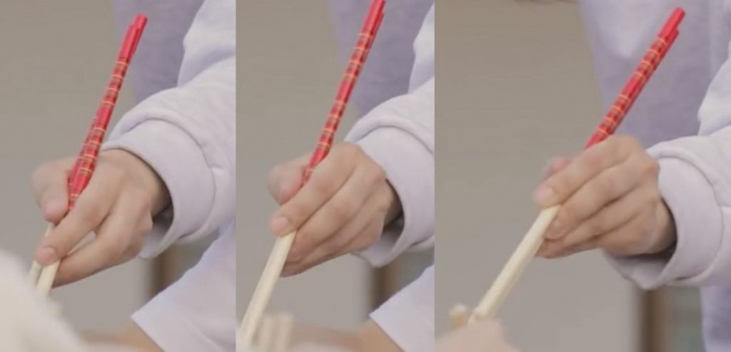 Marcosticks - Jeongyeon - between Standard Grip & Idling Thumb - Lefthanded-Sequence - open to compression posture - TWICE TdoongEp6-sect1 00-41 Jeongyeon c d e - chopstick grip
